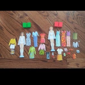 Two Magnetic Wood Fashion Dolls With Outfits